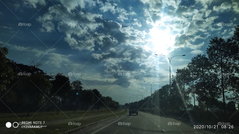Sun Shining Through Cloud