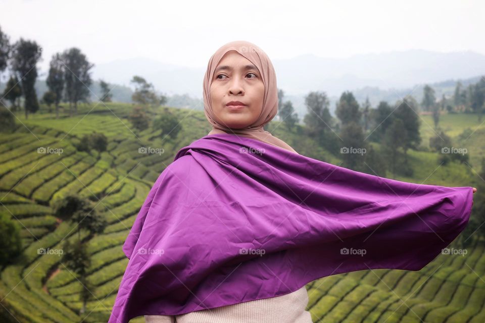 woman standing in field