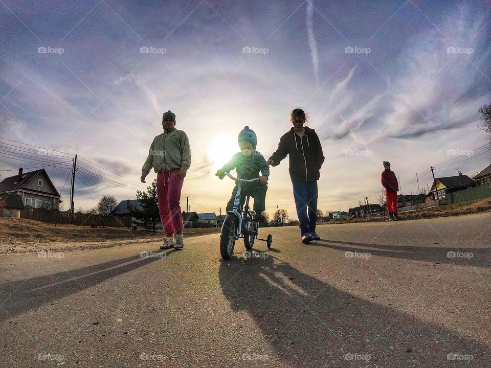 Little boy riding little bike