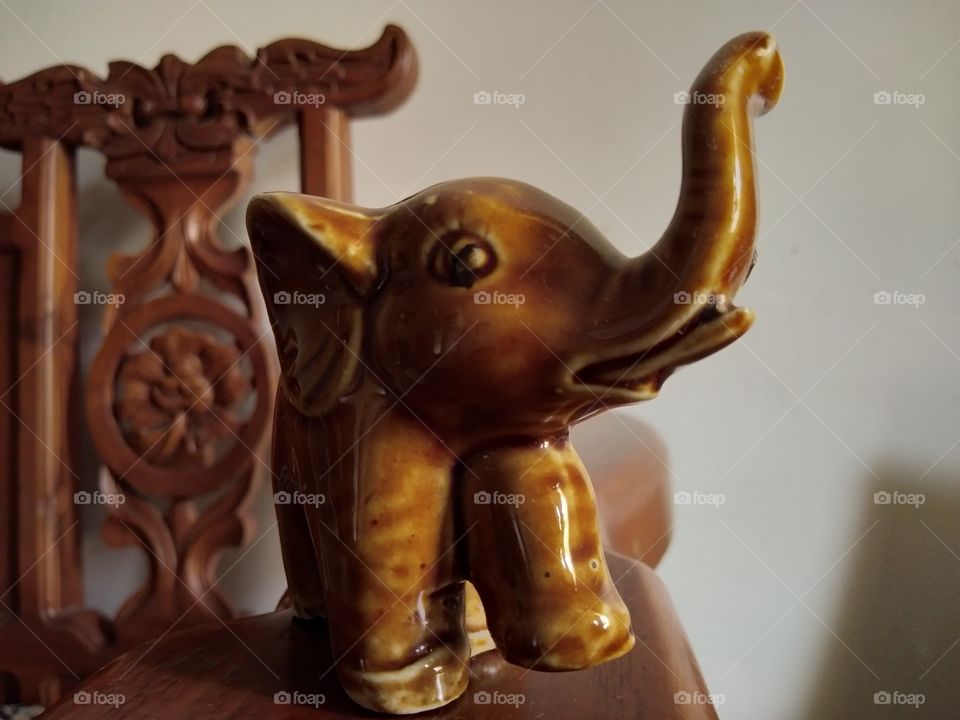 small elephant statue. made of burnt soil