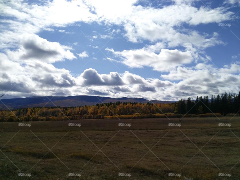 Clouds, autumn landscape