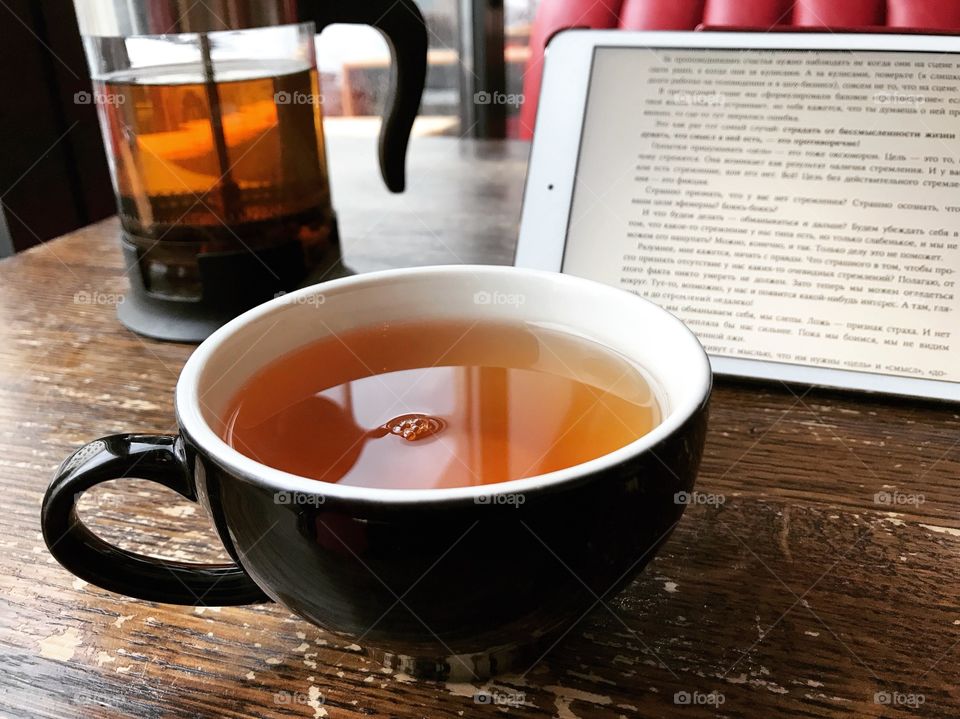 Reading books, drinking tea