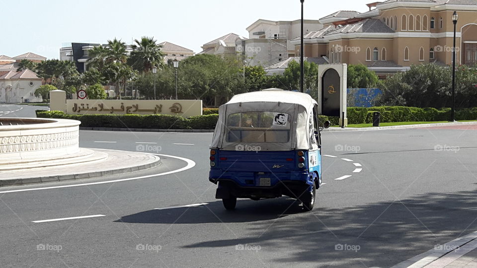Three wheeler Driver thru roundabout/ Luxery villa
