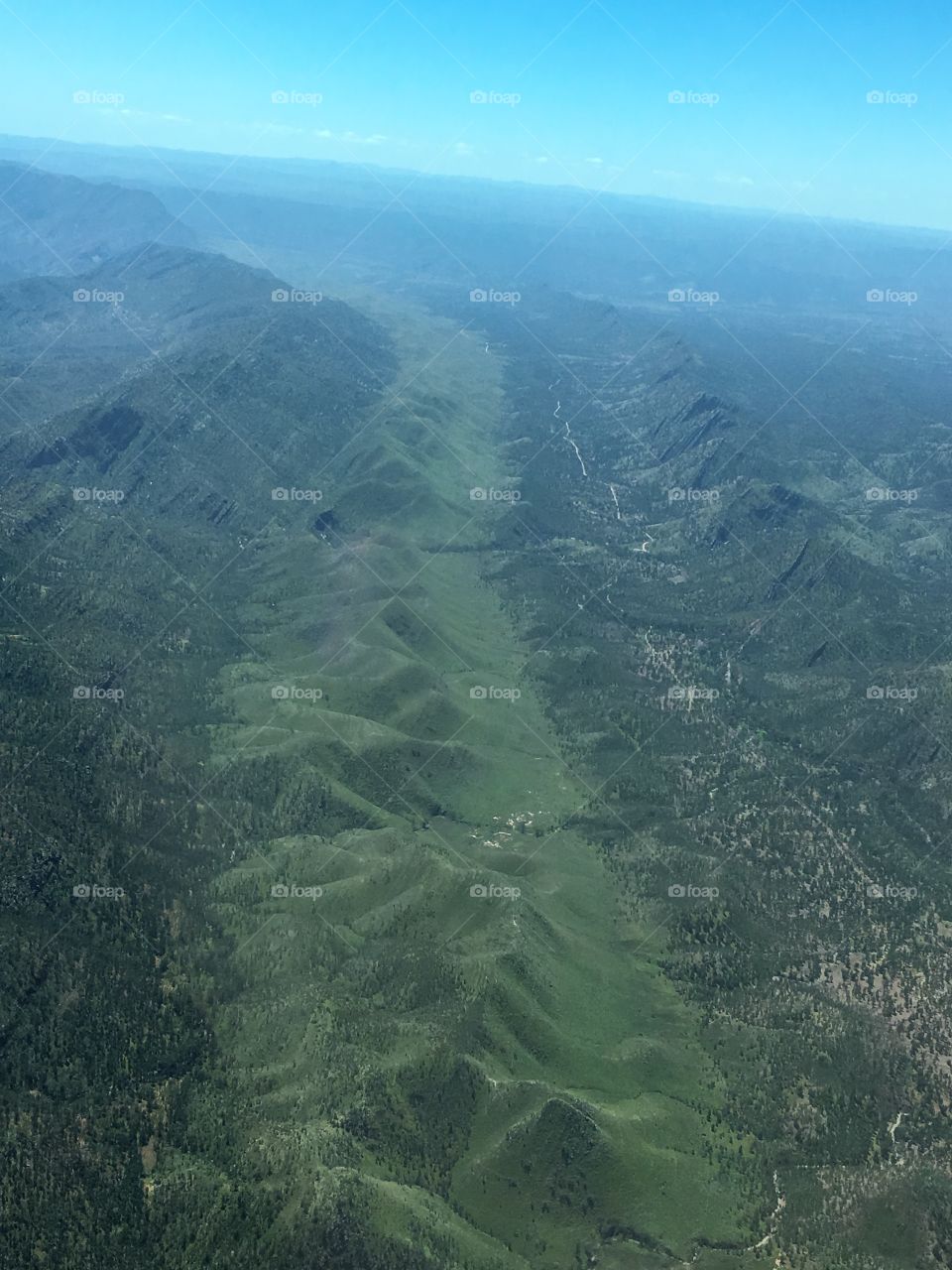 Flinders and surrounding mountain ranges in south Australia aerial view, in Springtime.  Quite unusual to see so much colour but there has been much rain. Look closely and you will also see many gorges