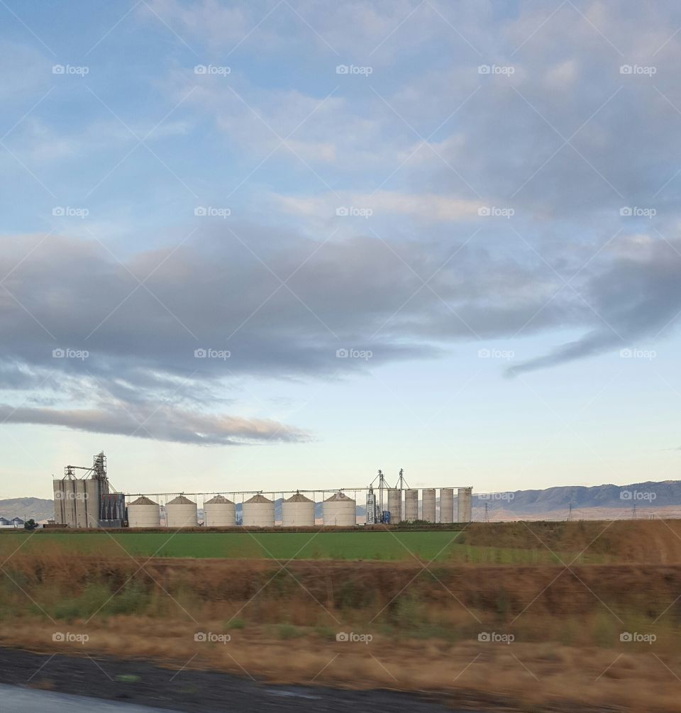 driving past many farms on highway 5