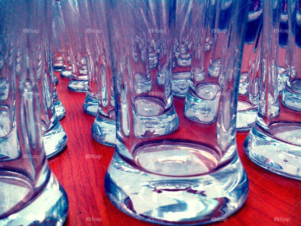 rows of empty drinking glasses