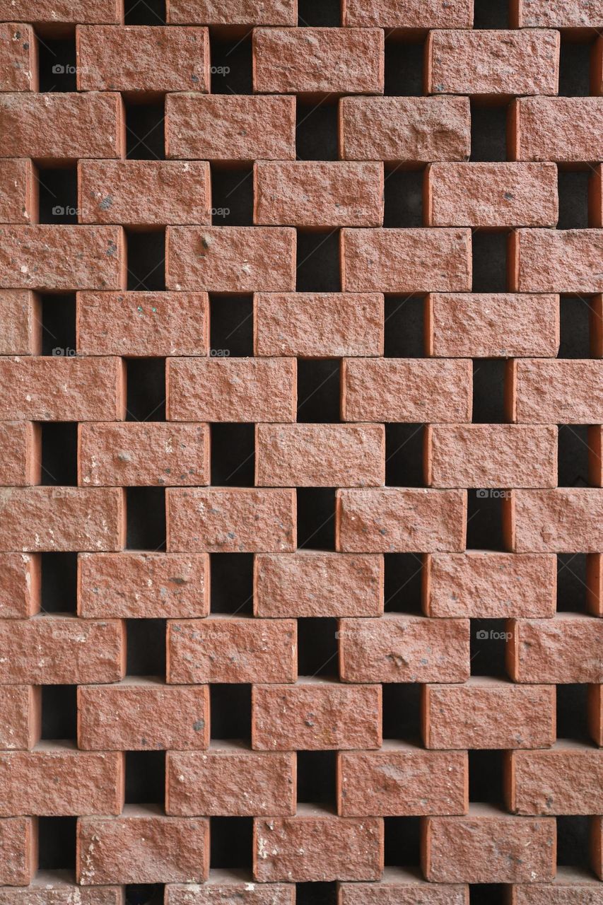 rectangular red brick wall