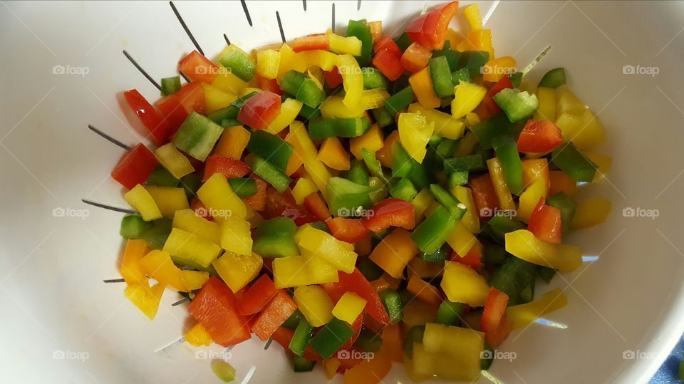 Cutting up bell peppers for dinner tonight.