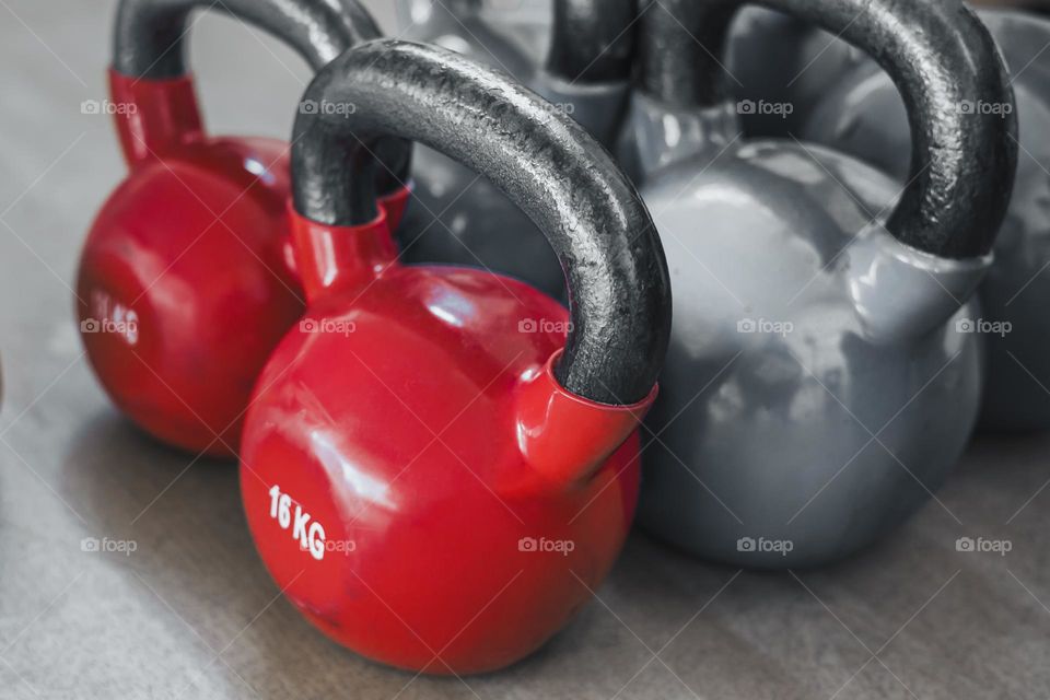 Kettlebell weightlifting concept . Colored  Iron Kettlebell Weight background