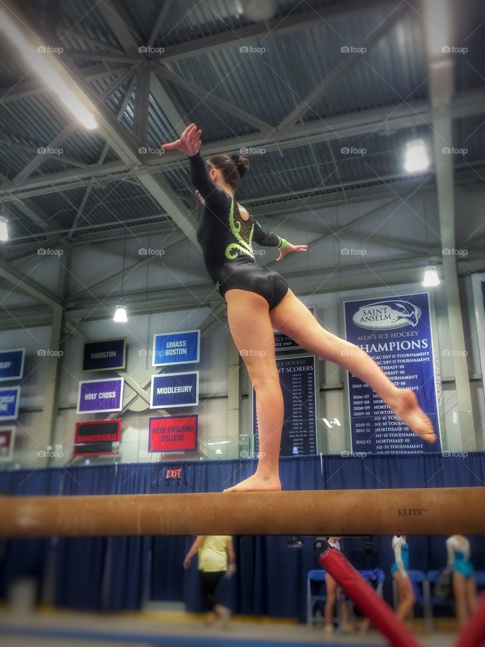 A young woman competing on the balance beam at the Northeast Regional Gymnastics Championships, 2016.