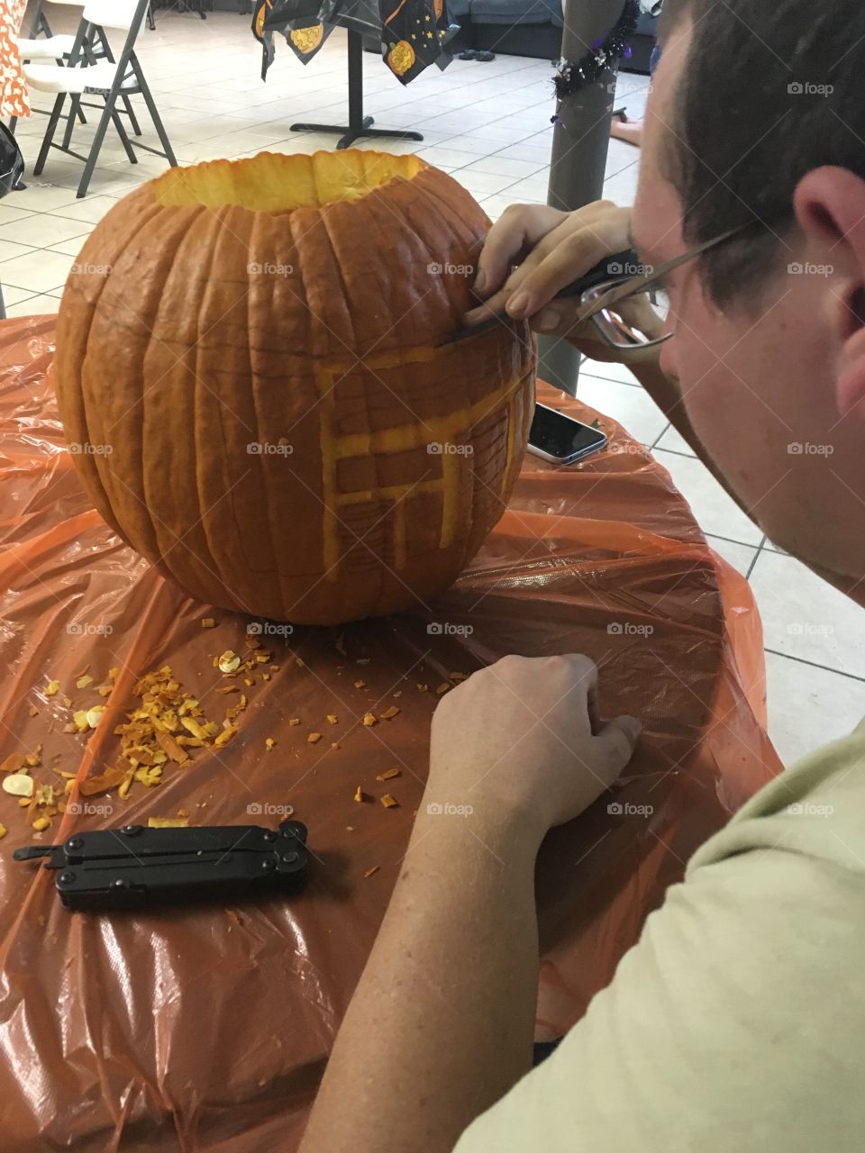 Pumpkin carving. Enjoying fall by carving pumpkins