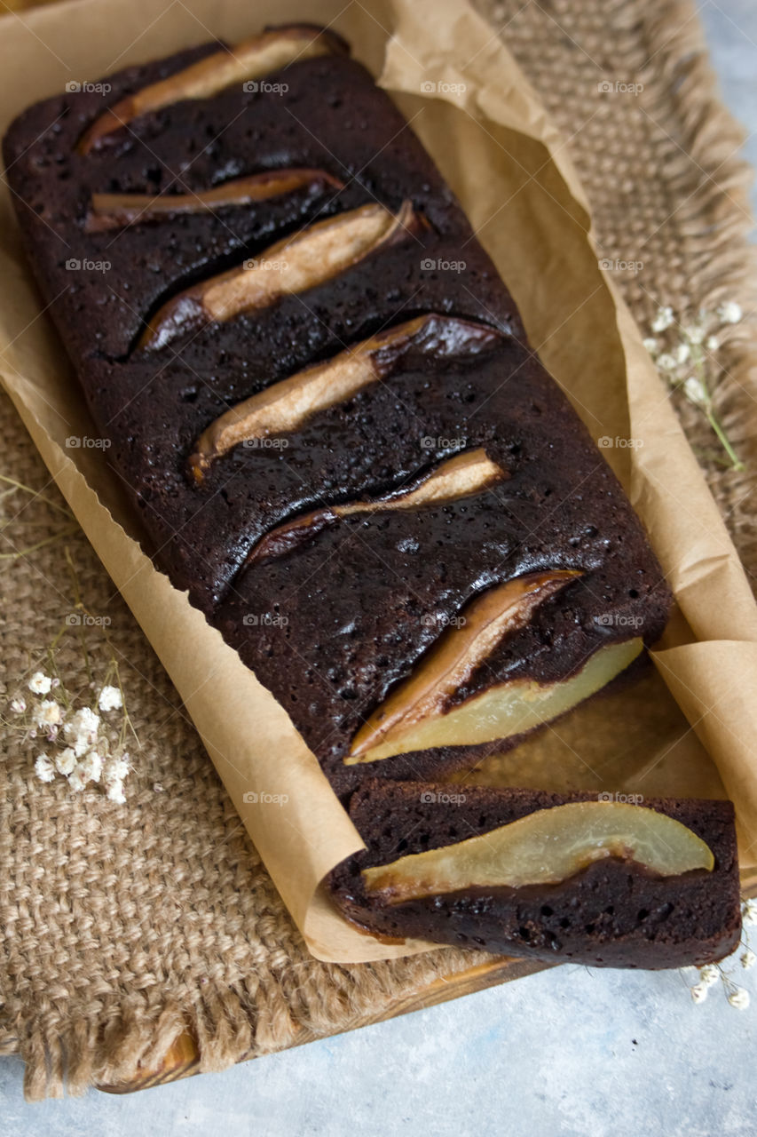 chocolate pear cake on table