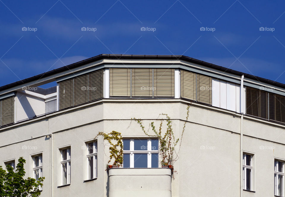 Low angle view of building against sky in city.