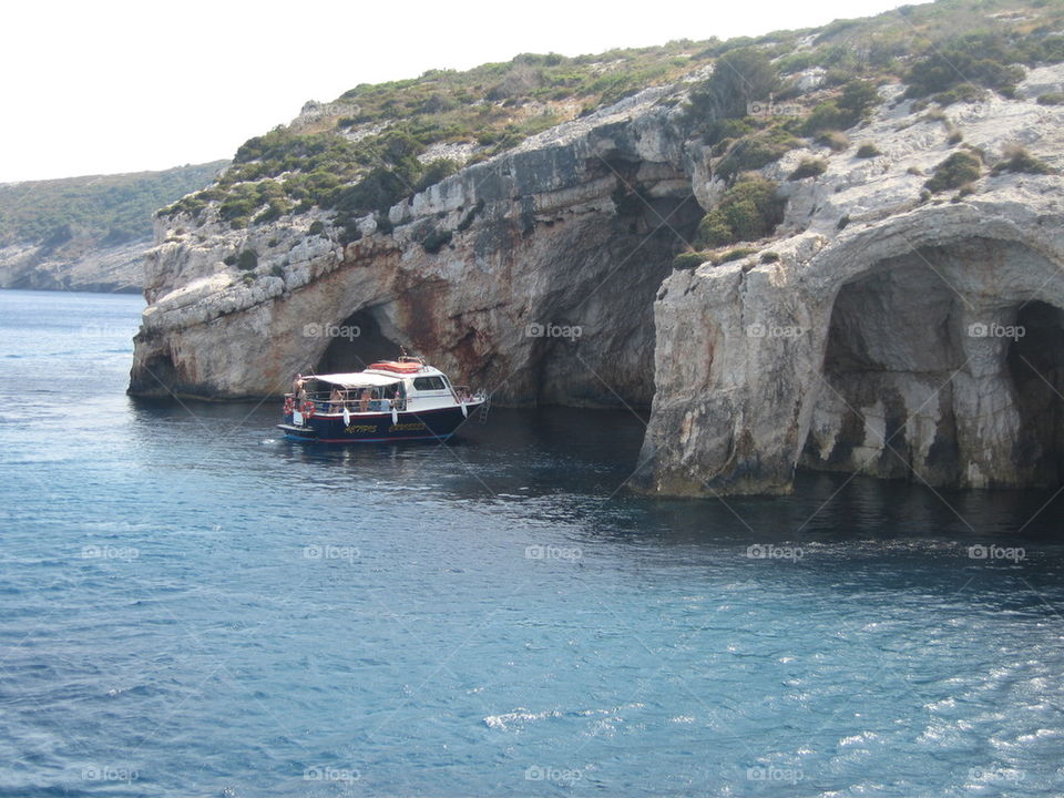 boat under the cliffs