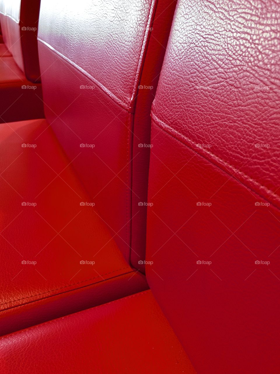 Red leather seats closeup 