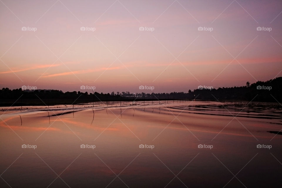 Dramatic sky reflected on sea