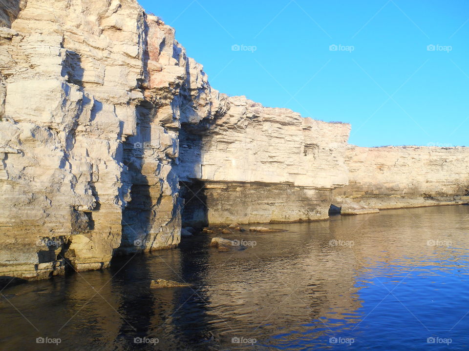 Reflection of rock in water