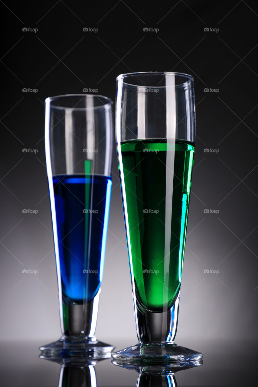 Blue and green Cocktail /  juice / alcohol in glasses