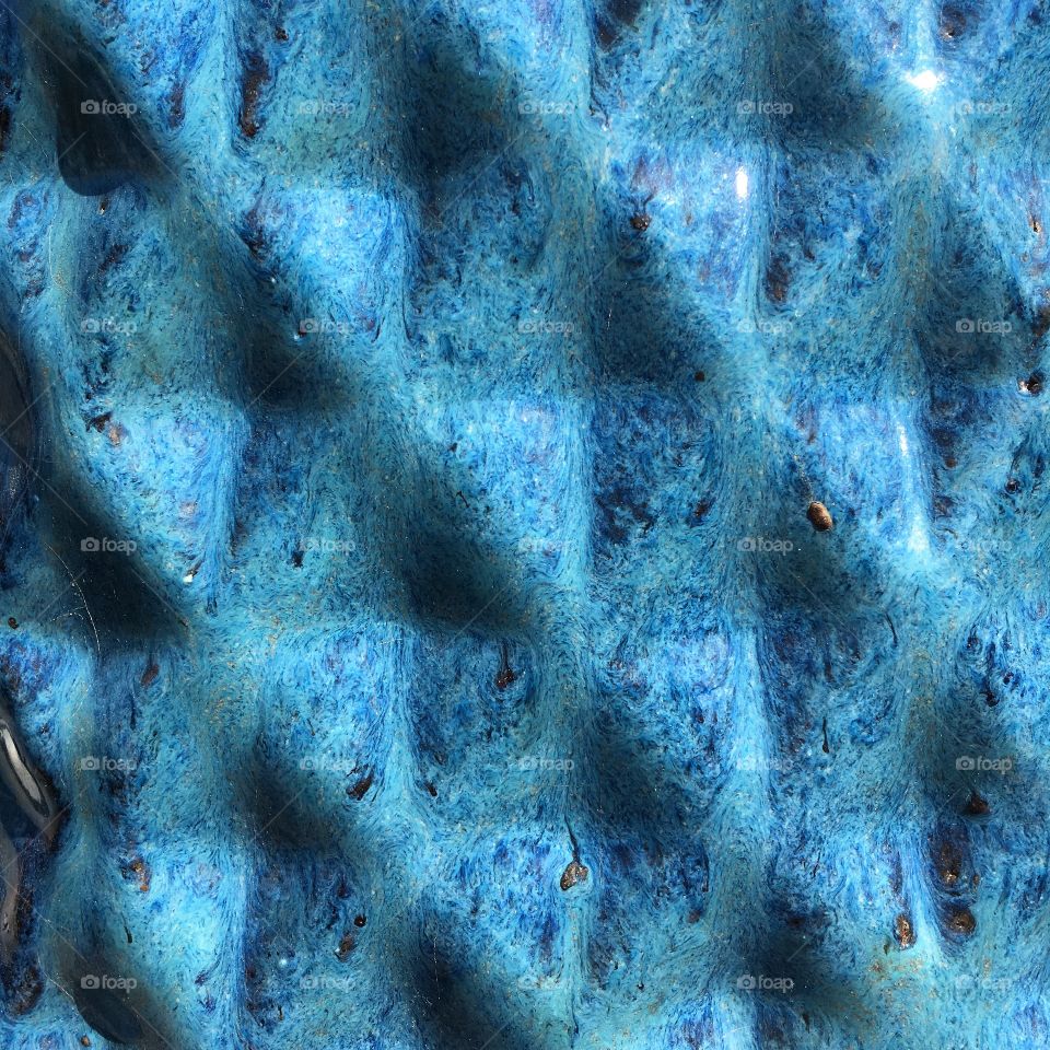 Glaze in blue on a planter