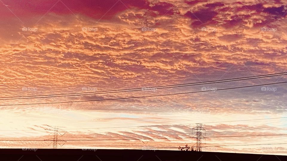 Evening sunset after sundown twilight engaged with full orange color. Sky