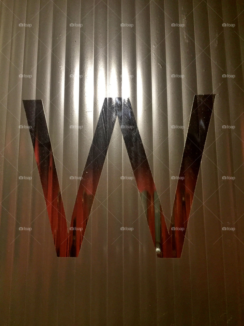 W - stands for Women's Room. 