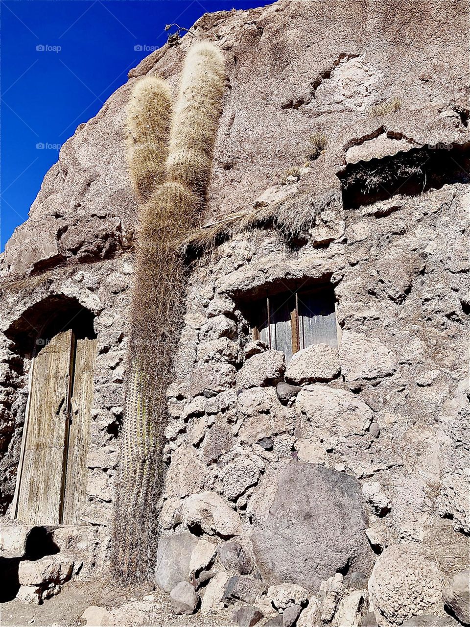 This ruin was built around a cavern in a mountain on the outskirts of the “Uyuni Salt Flats” in “Bolivia”. Along the outside a gigantic cactus grows. The “Inkas” built these structures and many served as burial grounds. 2022. Hypnotic Productions