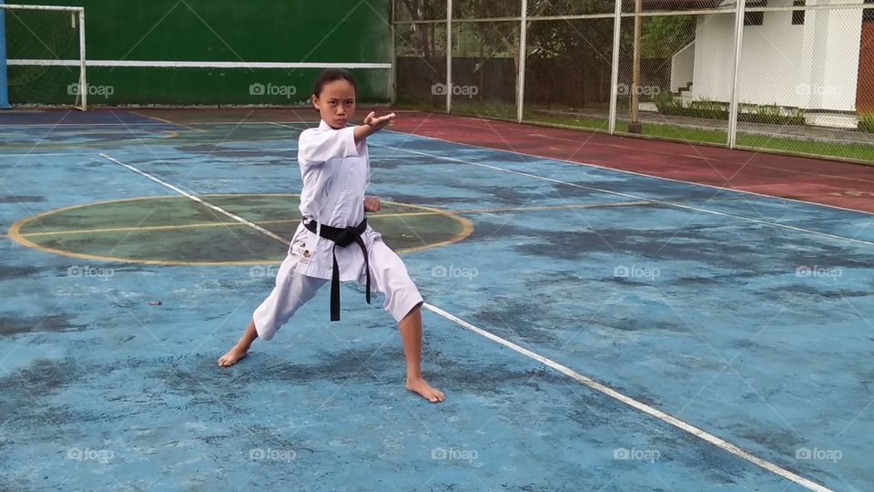 asian girl learning karate