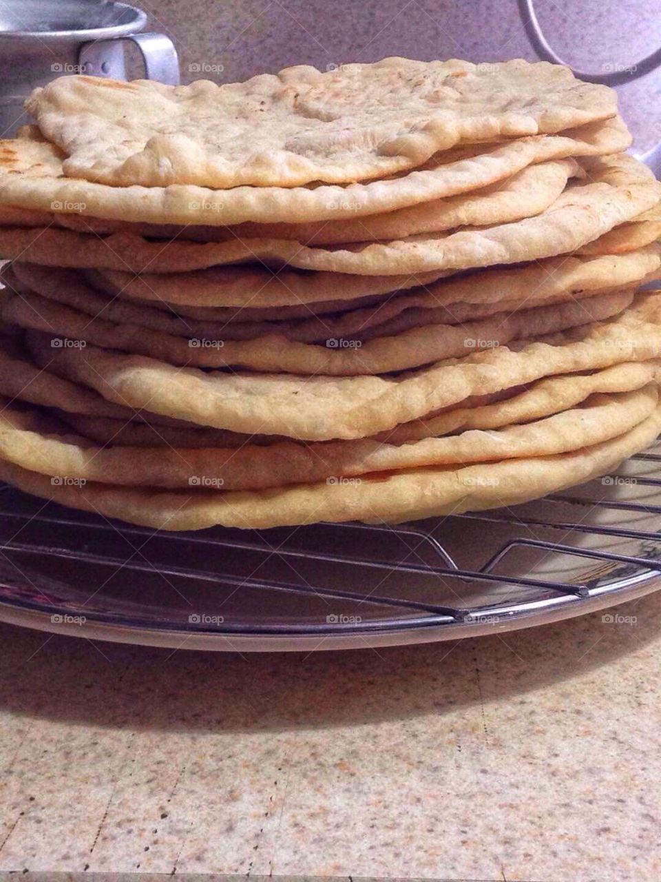 Homemade, hand rolled pita bread! Nothing better than homemade fresh. 