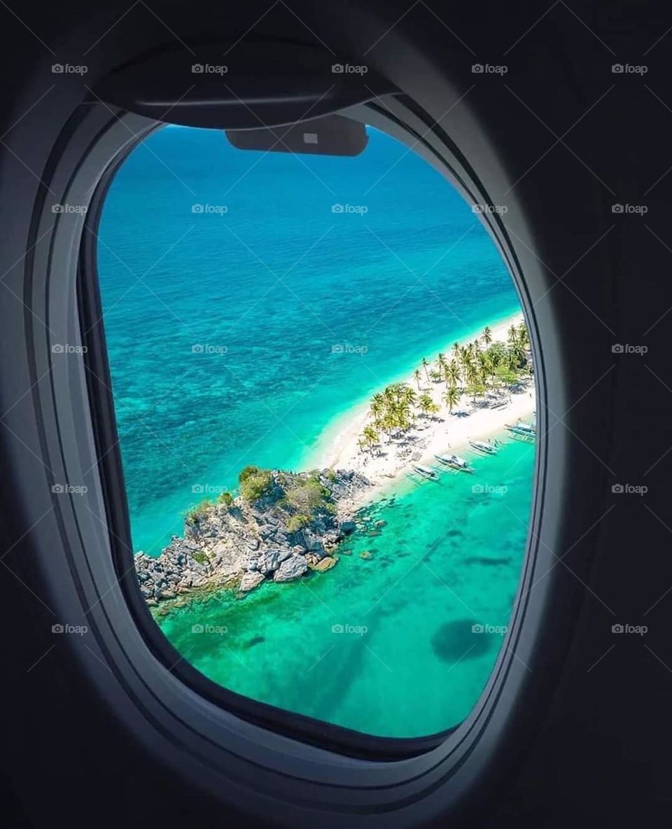 A view from the plane window of the Ilo-ilo sandbar island in the Philippines