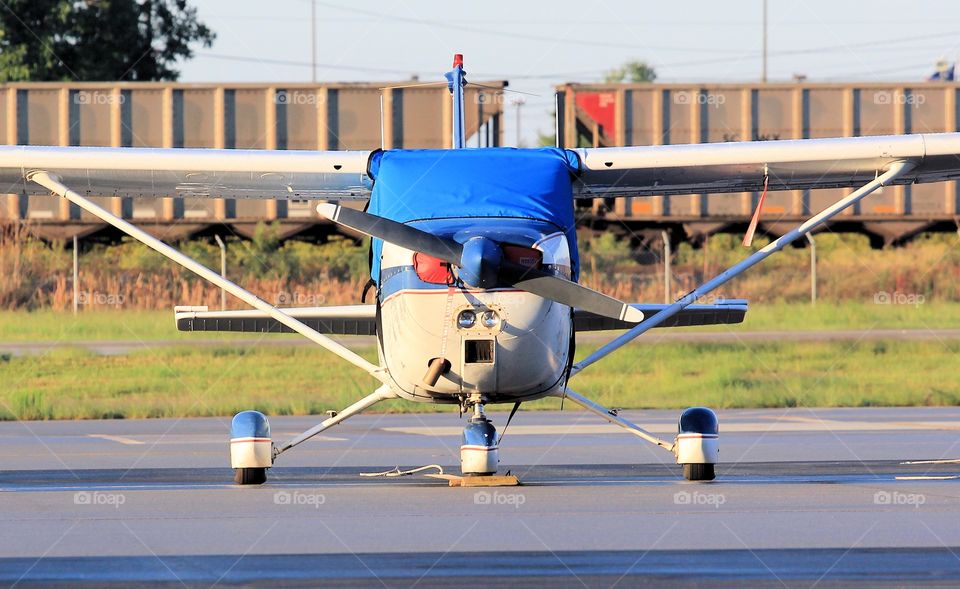 Parked Prop Plane - Windshield Covered