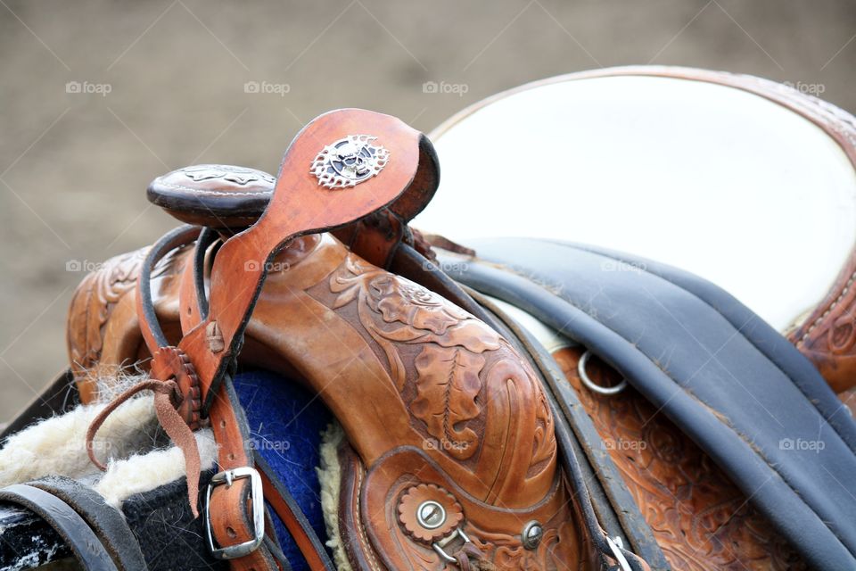 saddle. getting ready for a cowboy