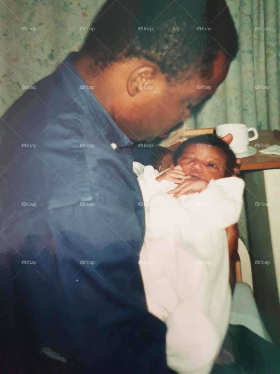 New born baby and dad