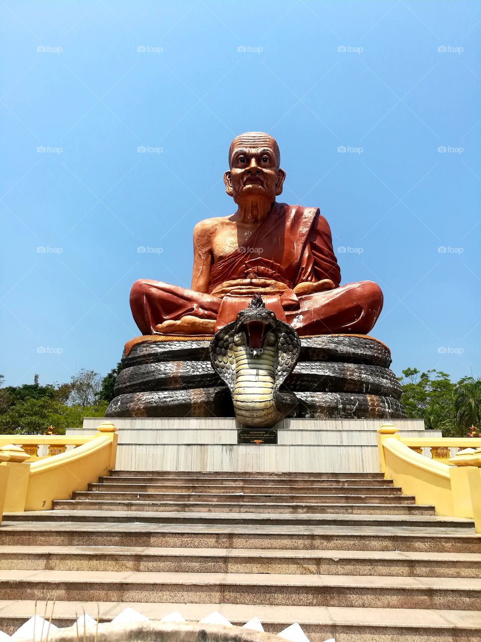 Buddha on a snake.  Mobile photo.