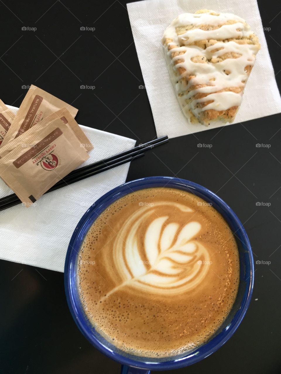 Coffee. Pretty latte and scone top down