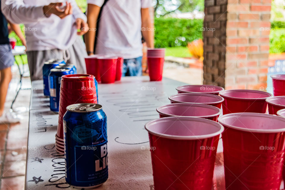 A colorful game of beerpong with popping colors