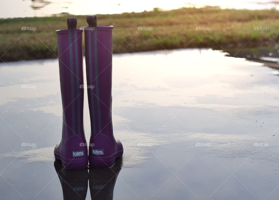 Purple Totes boots reflection