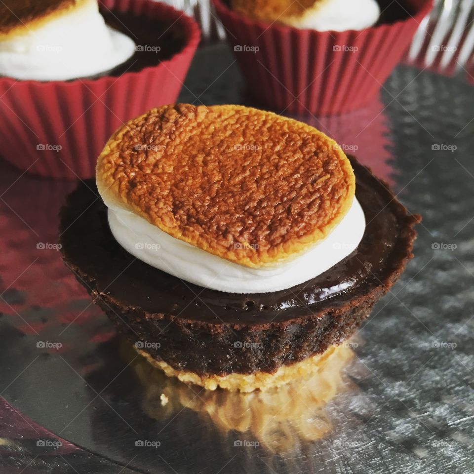 Chocolate cupcakes on table