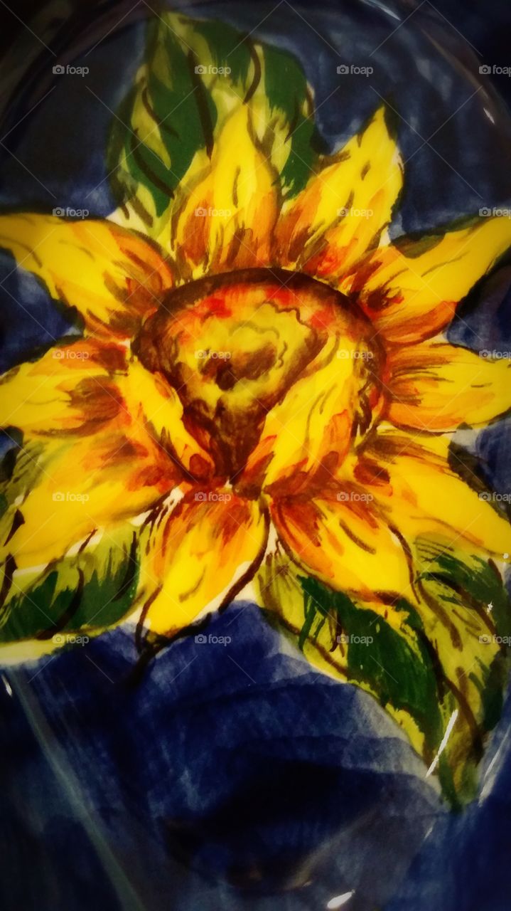 Handpainted sunflower pottery.