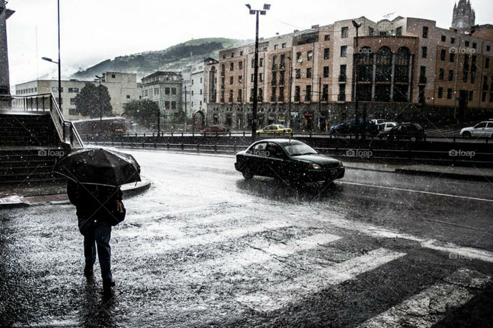 person in the street . rain