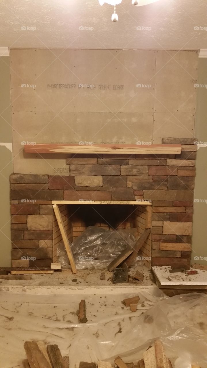Brick fireplace under construction 