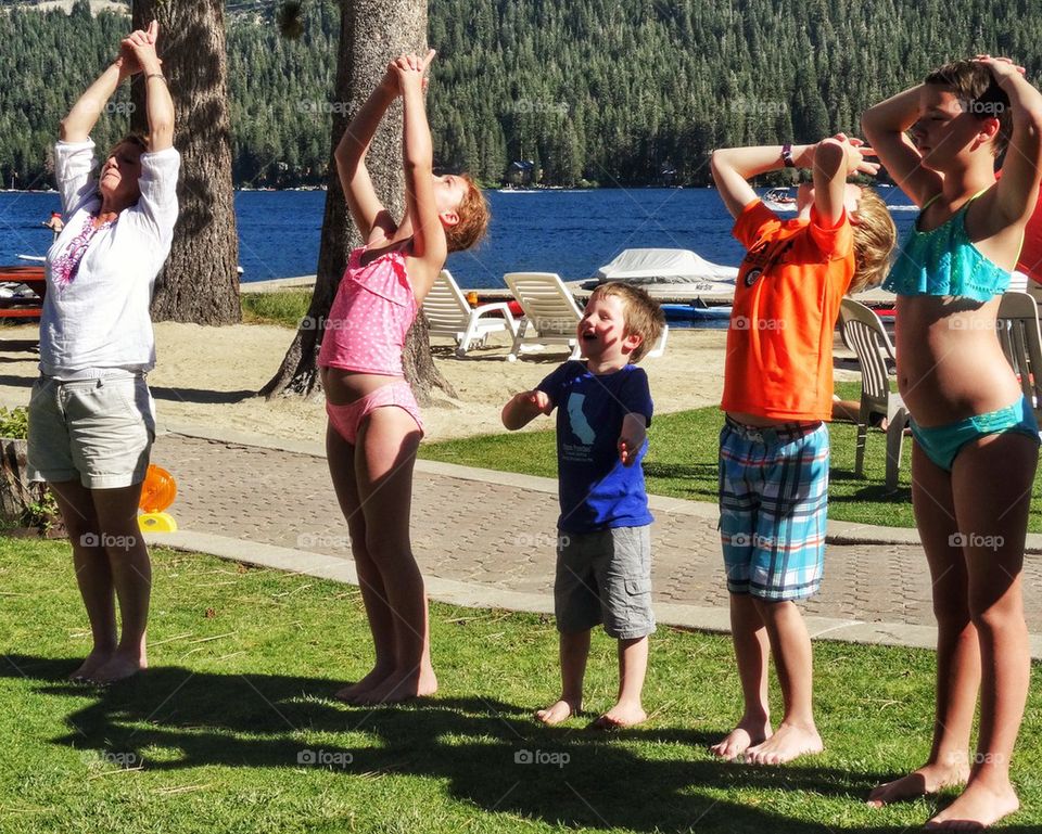 Healthy Family Doing Yoga. Calisthenics
