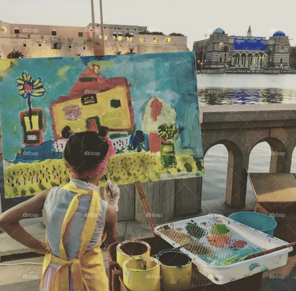 Tripoly drawing picture of central bank and Saraya