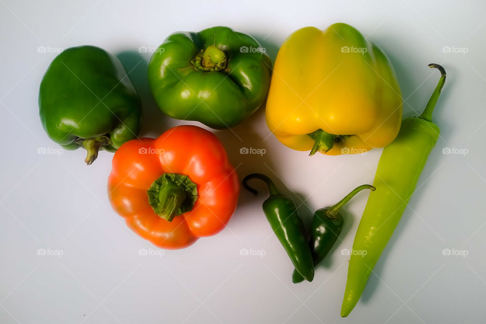 All types of Chillies on White Background