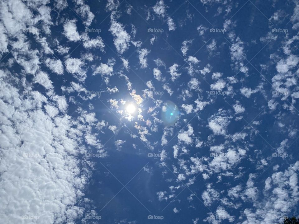 Looking up at this shining beautiful sun in the sky 