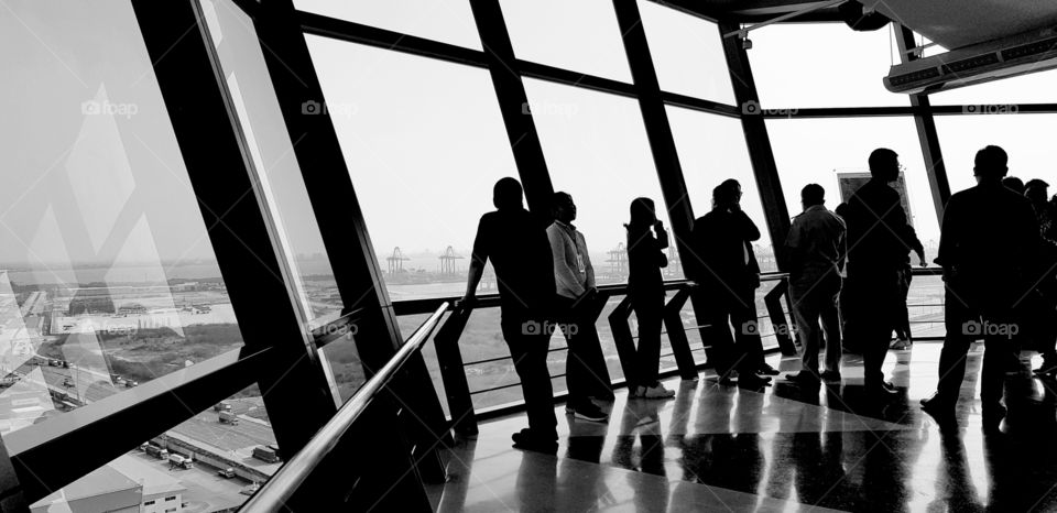 Shadow of people at lighthouse, Laemchabang Port, Chonburi Province, Thailand