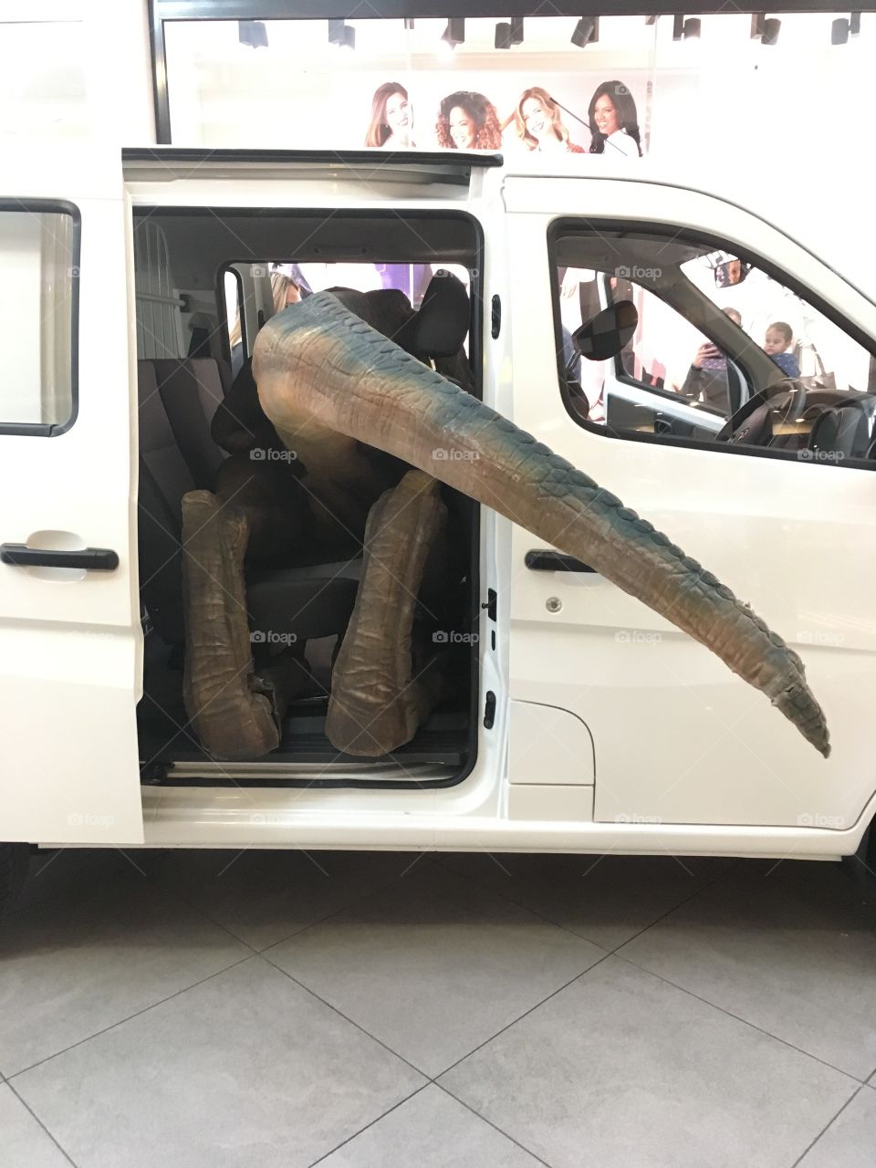 Dinosaur raptor in car!