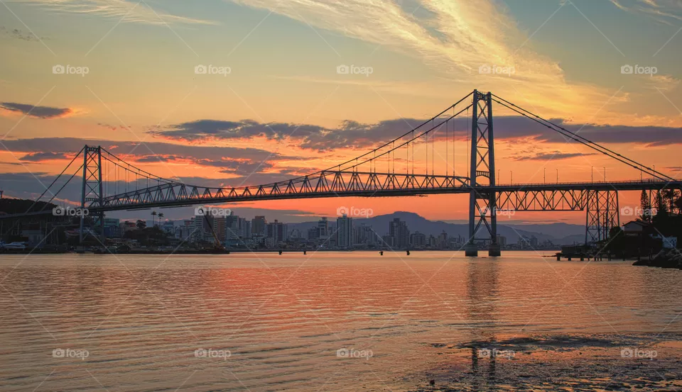 Hercílio Luz Bridge in Florianópolis - Santa Catarina - Brazil, with sunset in the background.