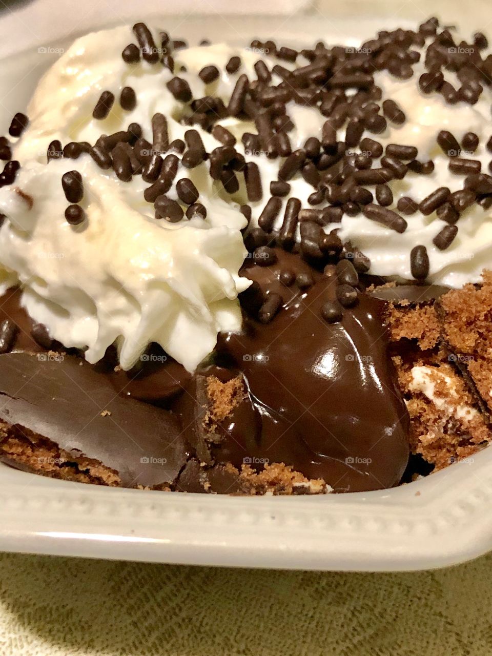 I created this sweet "Chocolate Bliss" trifle dessert by layering pieces of a chocolate covered "devil dog" with chocolate pudding and whipped cream, topped with chocolate sprinkles. 