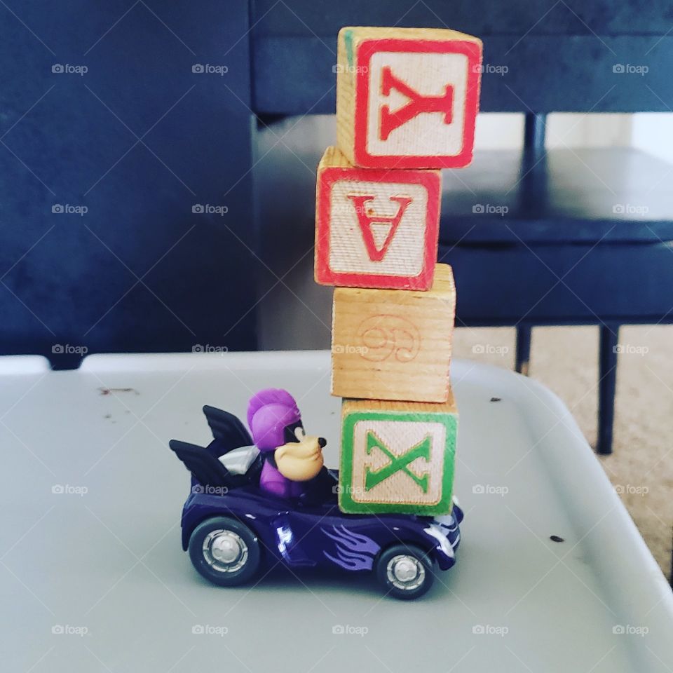 creative play. blocks stacked on toy car.