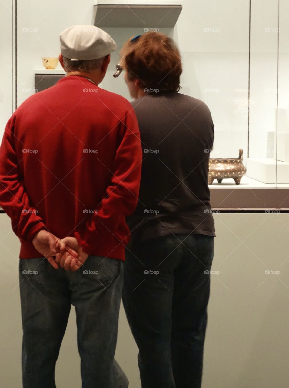 Older Man And Woman Viewed From Behind